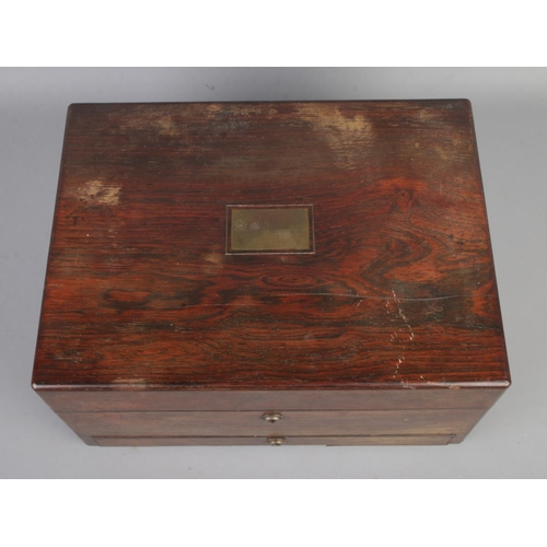 68 - A mid Nineteenth century rosewood two tier vanity box, with lower drawer. Featuring fitted interior ... 