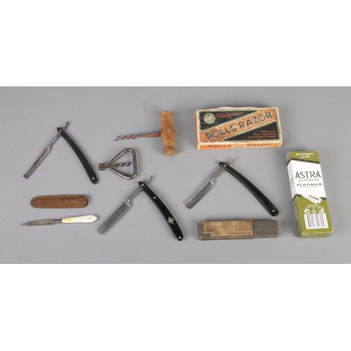 75 - A collection of vintage cut throat razors and corkscrews to include Puma Solingen, George Butler Kee... 