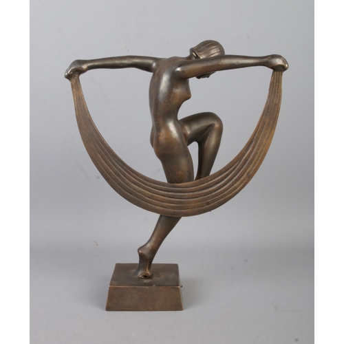 458 - A pair of Art Deco style bronze female dancers, both holding scarves, raised on square bases. Height... 