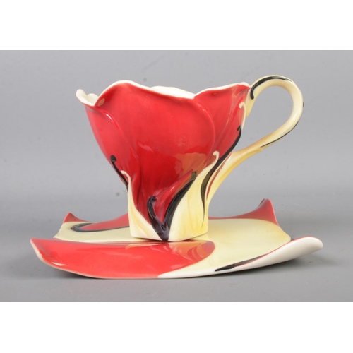 459 - A Franz ceramic cup and saucer, in the rose design from the 'Garden Blossoms' collection. FZ02079.