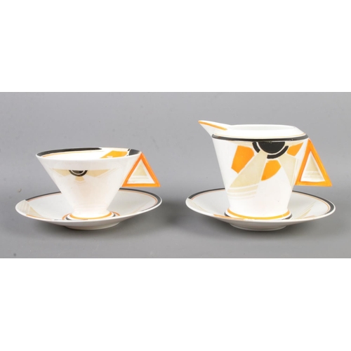 460 - Four pieces of Art Deco Shelley ceramics in the 'Vogue Sunray' design. Contains one cup and saucer, ... 