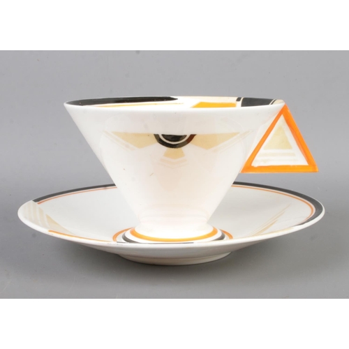 460 - Four pieces of Art Deco Shelley ceramics in the 'Vogue Sunray' design. Contains one cup and saucer, ... 