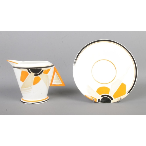 460 - Four pieces of Art Deco Shelley ceramics in the 'Vogue Sunray' design. Contains one cup and saucer, ... 