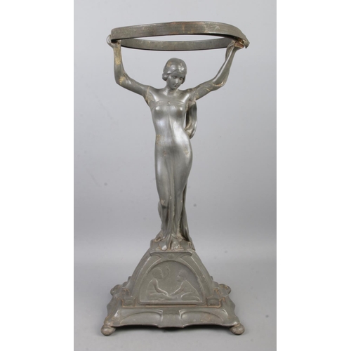 467 - An Art Nouveau Imperial Zinn Bitter & Gobbers pewter centerpiece, 5300, formed as a woman in flowing... 