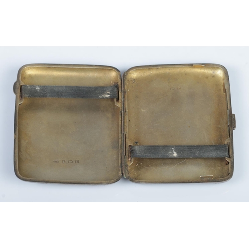 476 - A George V hinged silver cigarette case, with scrolled decoration. Assayed for Birmingham, 1916 by J... 