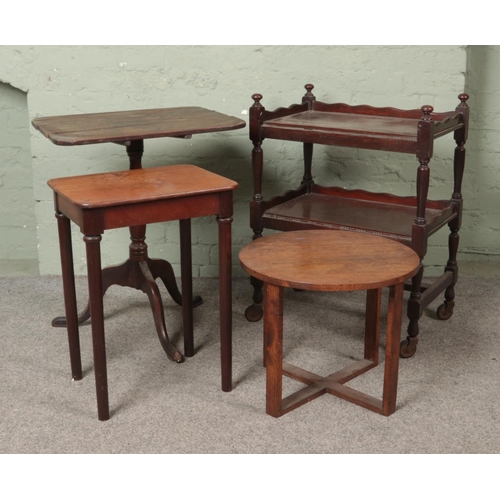 497 - A collection of assorted occasional tables along with a two tier trolley. Includes Georgian oak tilt... 