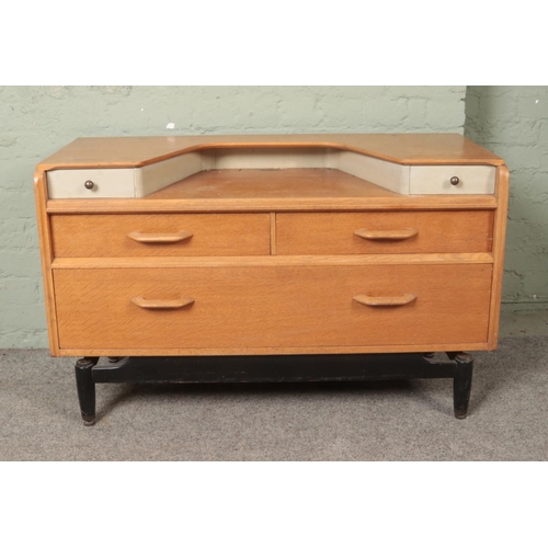 509 - A G-Plan E Gomme dressing table, with lower drawers. Height: 67cm, Width: 106cm, Depth: 44cm.