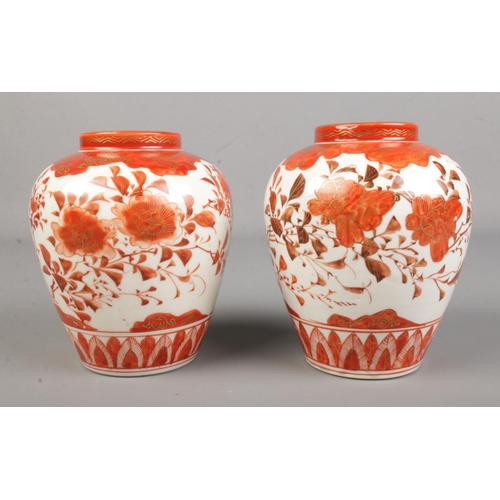 10 - A pair of Japanese Bulbous vases, signed to base. 

Hx13cm