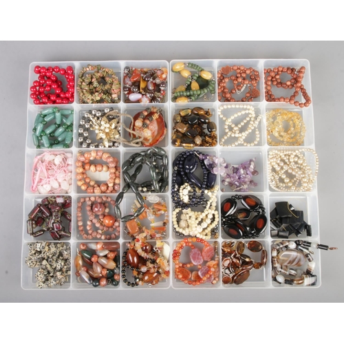 43 - Two trays of good quality gemstone costume jewellery including amethyst and tigers eye examples