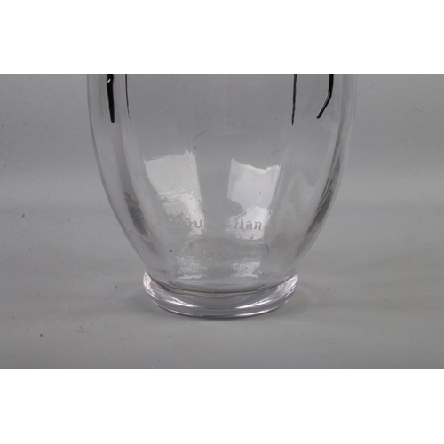 470 - A Daum Nancy France clear glass bottle with applied black decoration.