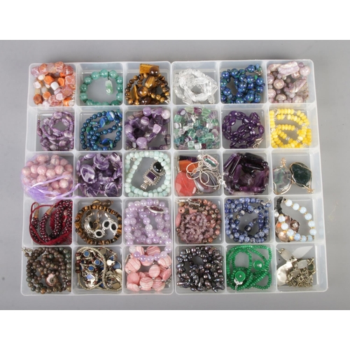 78 - Two trays of good quality gemstone costume jewellery including tigers eye, sodalite etc