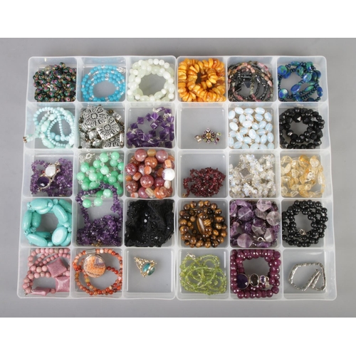 82 - Two trays of good quality gemstone costume jewellery including French jet, tigers eye, amethyst, tur... 