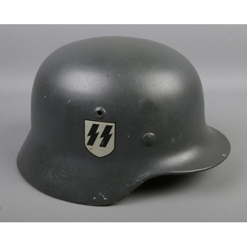 487 - WW2 German hand rendered double decal M40 Helmet with webbing and hand written name to inside 'Schra... 