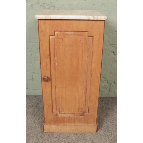 524 - A pine pot cupboard with marble top and inlaid detail to front panel 

Hx77cm
Wx37cm
Dx38cm