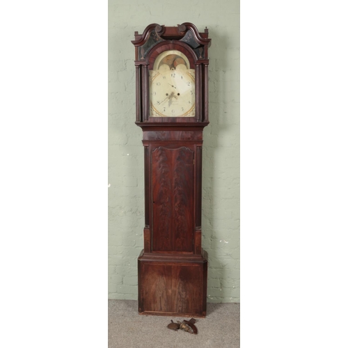 536 - A mahogany long case clock with Moon roller and Arabic numeral hand painted dial and stamped John Wa... 