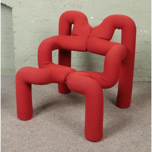 539 - A Varier Ekstrem Chair in red fabric, designed by Terje Ekstrom.