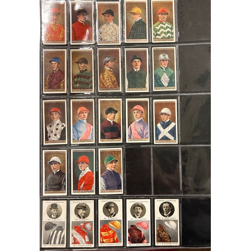 110 - A folder of assorted Sporting cigarette and trade cards to include Wills Cricketer Series 1901, Tadd... 