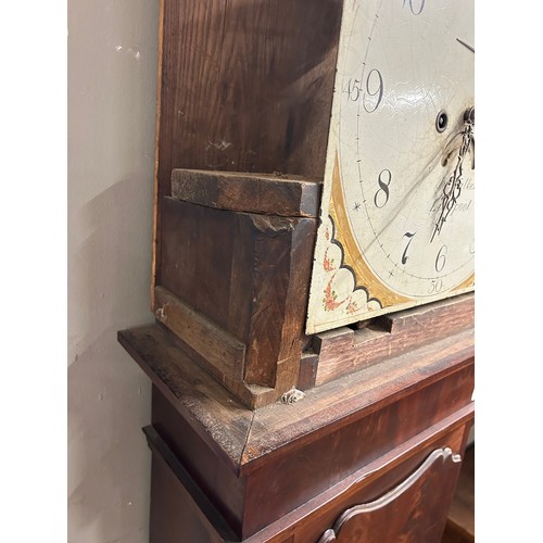 536 - A mahogany long case clock with Moon roller and Arabic numeral hand painted dial and stamped John Wa... 