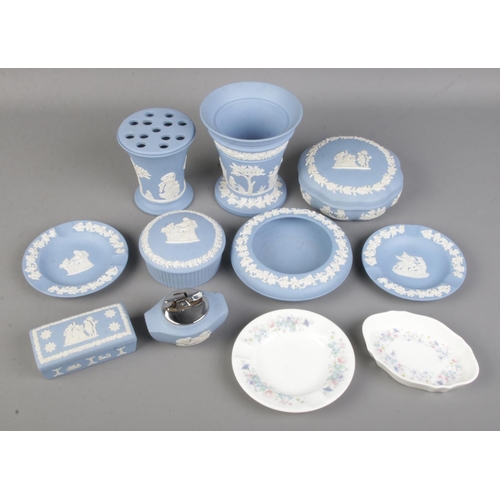 32 - Collection of Wedgwood, nine pieces of 20th century Wedgwood pale blue jasperware includes a lighter... 