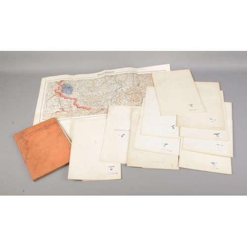 33 - A good collection of German WWII Third Reich ordinance survey maps bearing eagle emblem along with a... 