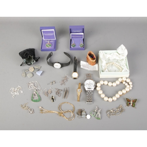 36 - A collection of assorted costume jewellery and wristwatches to include necklaces, Sekonda, earrings,... 