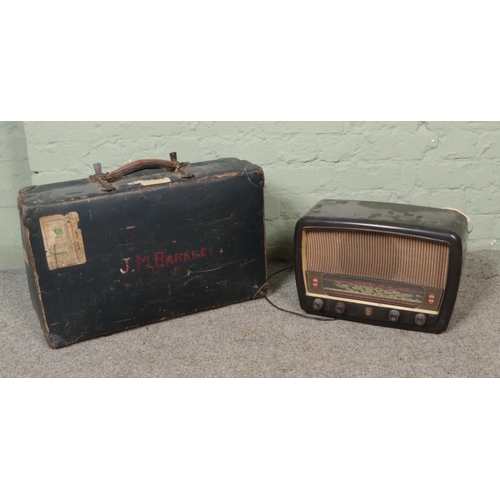 280 - A Philips bakelite cased valve radio MK4009 along with a vintage Revelation suitcase.