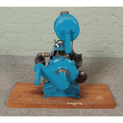 304 - A J.A.P Model 25 stationary engine mounted on wooden plinth