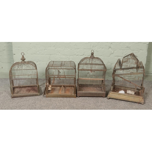 315 - Four vintage bird cages, include Genycage example.