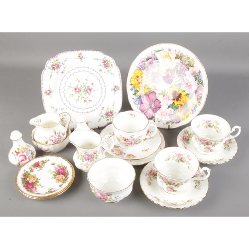 58 - A collection of Royal Albert and Royal Crown Derby china. Includes Petit Point, Old Country Roses, M... 