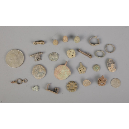 344 - A small quantity of metal detector finds to include rings, coins, thimbles, small badges, etc.