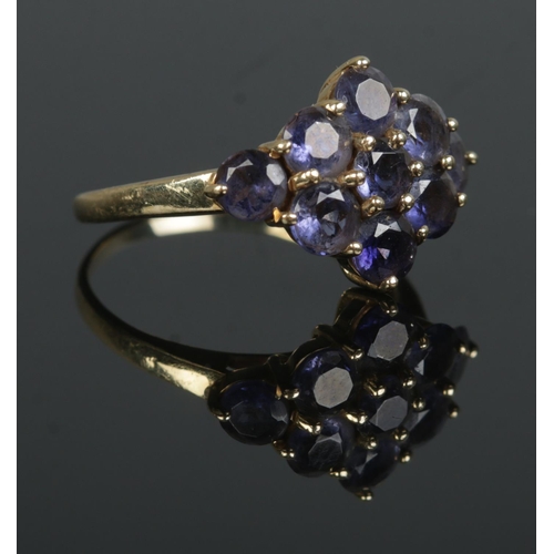 361 - A 14ct Gold Iolite cluster ring, with nine stones set in a diamond formation. Size N½. Total weight:... 