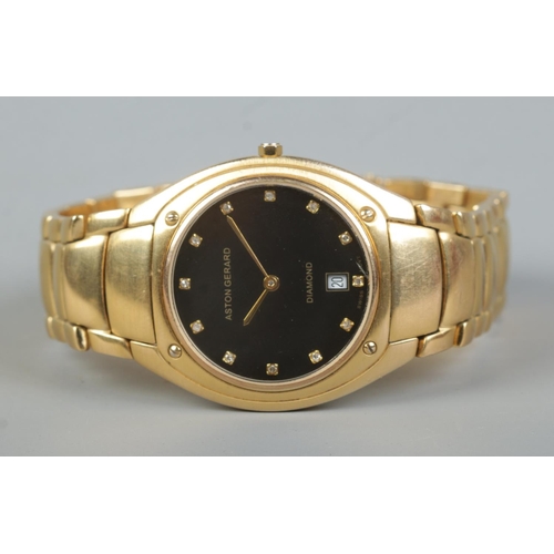 377 - An Aston Gerrard 18ct electroplated gold quartz wristwatch, with black dial featuring diamond marker... 