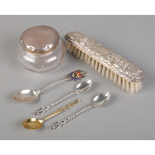 382 - A small quantity of silver. Includes brush, three Norwegian silver spoons (830), Bridlington souveni... 