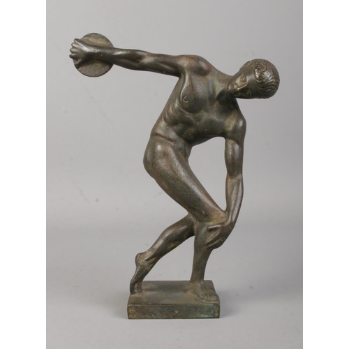 389 - After Myron; a bronze model formed as Discobolus. Height: 18.5cm.