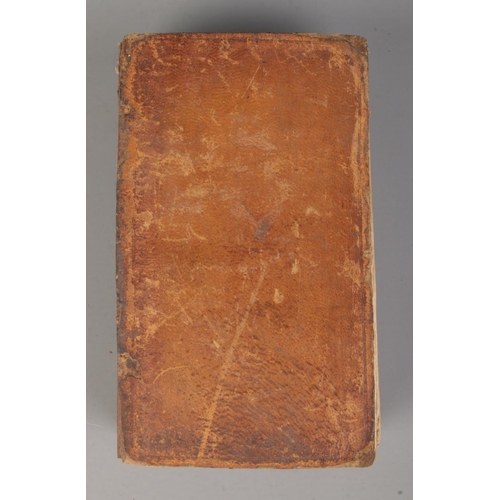 395 - An Eighteenth Century leather bound book; 'C. Julii Caesaris et A. Hirtii De rebus a C. Julio Caesar... 