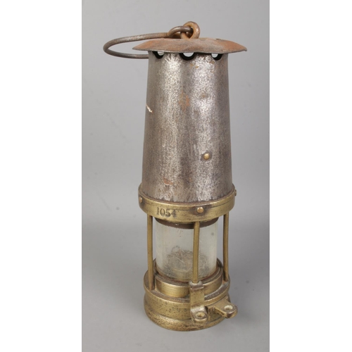 426 - A Davis Kirkby miners safety lamp stamped 1054.