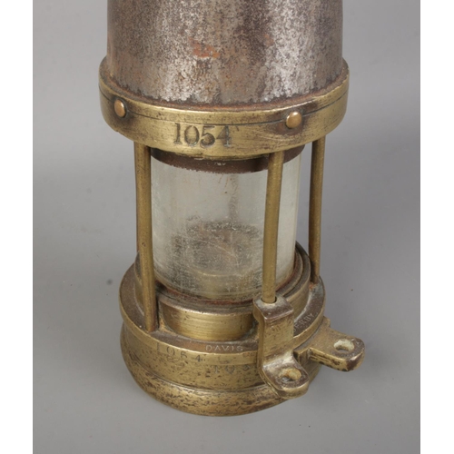 426 - A Davis Kirkby miners safety lamp stamped 1054.