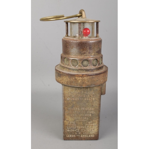 429 - A Leeds 'Ringrose' firedamp alarm, produced by the International Gas Detectors Ltd. Stamped 124 to t... 