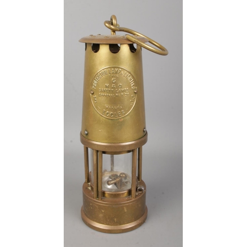 432 - An Eccles type 6 brass miners safety lamp by the Protector Lamp and Lighting Co. Ltd.