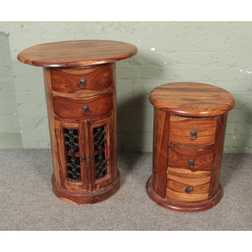 446 - Two modern mango wood circular beside cabinets to include set of three drawers and set of two drawer... 