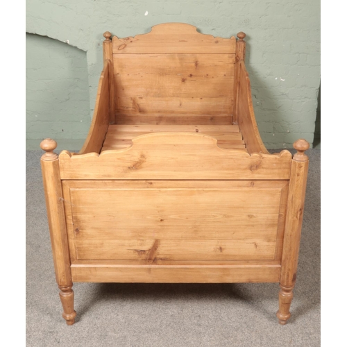 447 - A pine single bed. Height: 97cm, Length: 189cm, Depth: 99cm.