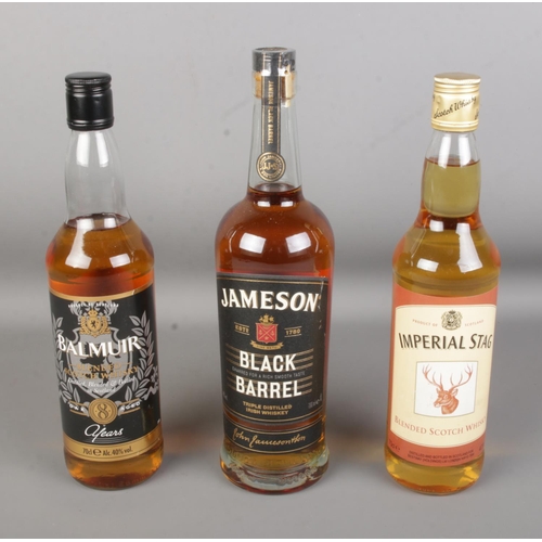 93 - Three bottles of assorted whisky to include Imperial Stag, Balmuir and Jameson Black Barrel.