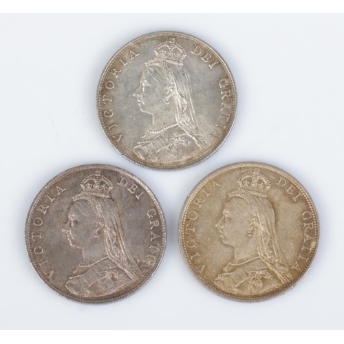 423 - Three Victorian silver florins, two dated 1887, the other 1888.