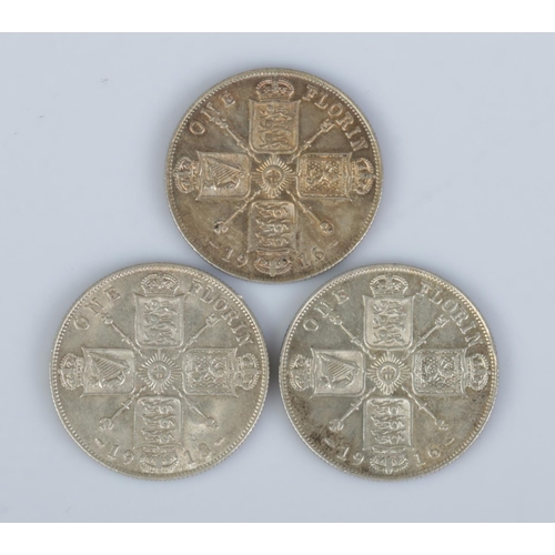 437 - Three George V silver florins; two dated 1916, one 1918.