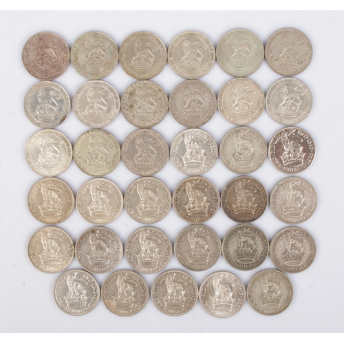 446 - Thirty five George V silver shillings. Consecutive run of dates from 1920-1936.