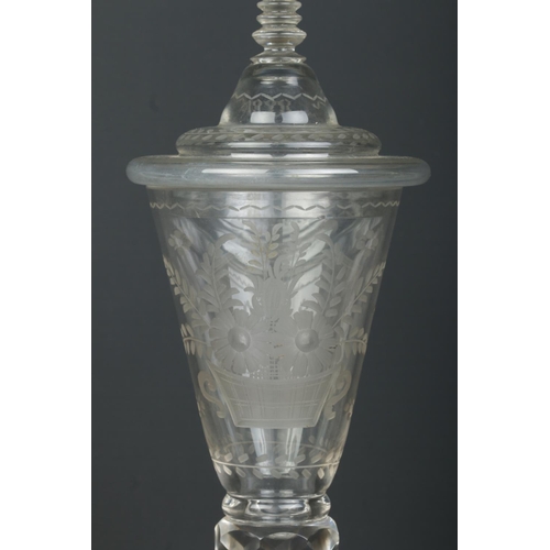 1 - A 19th century glass wine goblet and cover, possibly German. Having engraved armorial crest and flor... 