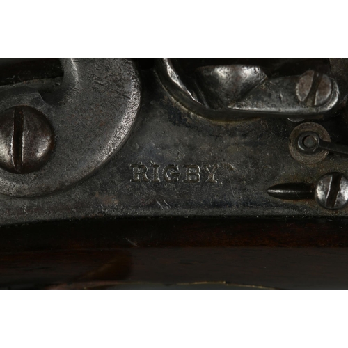 109 - An early 19th century flint lock pistol by Rigby, Dublin. Having brass trigger guard and pommel and ... 