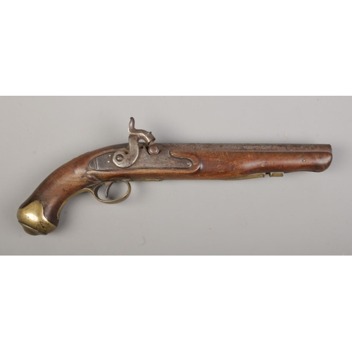 110 - A 19th century percussion pistol. Having brass trigger guard and pommel. Birmingham proof marks to b... 