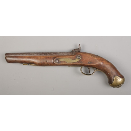 110 - A 19th century percussion pistol. Having brass trigger guard and pommel. Birmingham proof marks to b... 