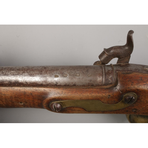 110 - A 19th century percussion pistol. Having brass trigger guard and pommel. Birmingham proof marks to b... 